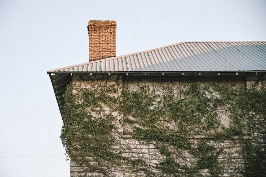 A brick chimney in need of a chimney repair service
