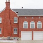 Masonry chimney in a brick house