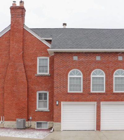 Masonry chimney in a brick house